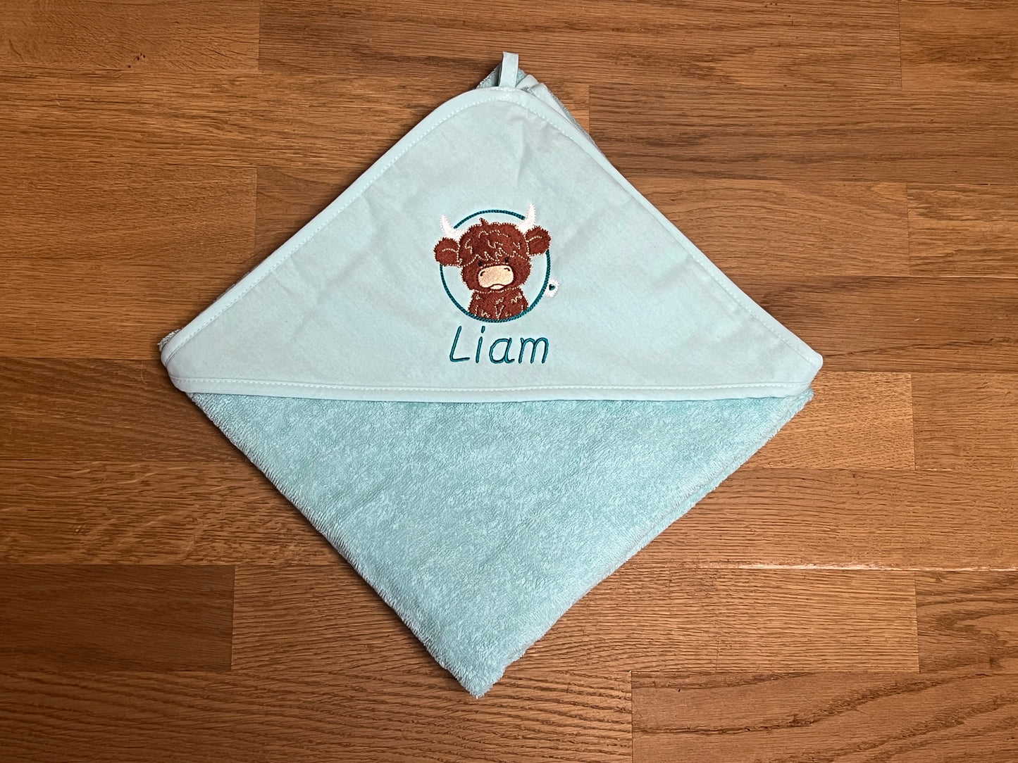 Baby-Handtuch Hochland-Rind (personalisiert)